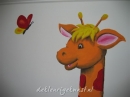 Zijn vrolijke koppie fleurt de hele kamer op.